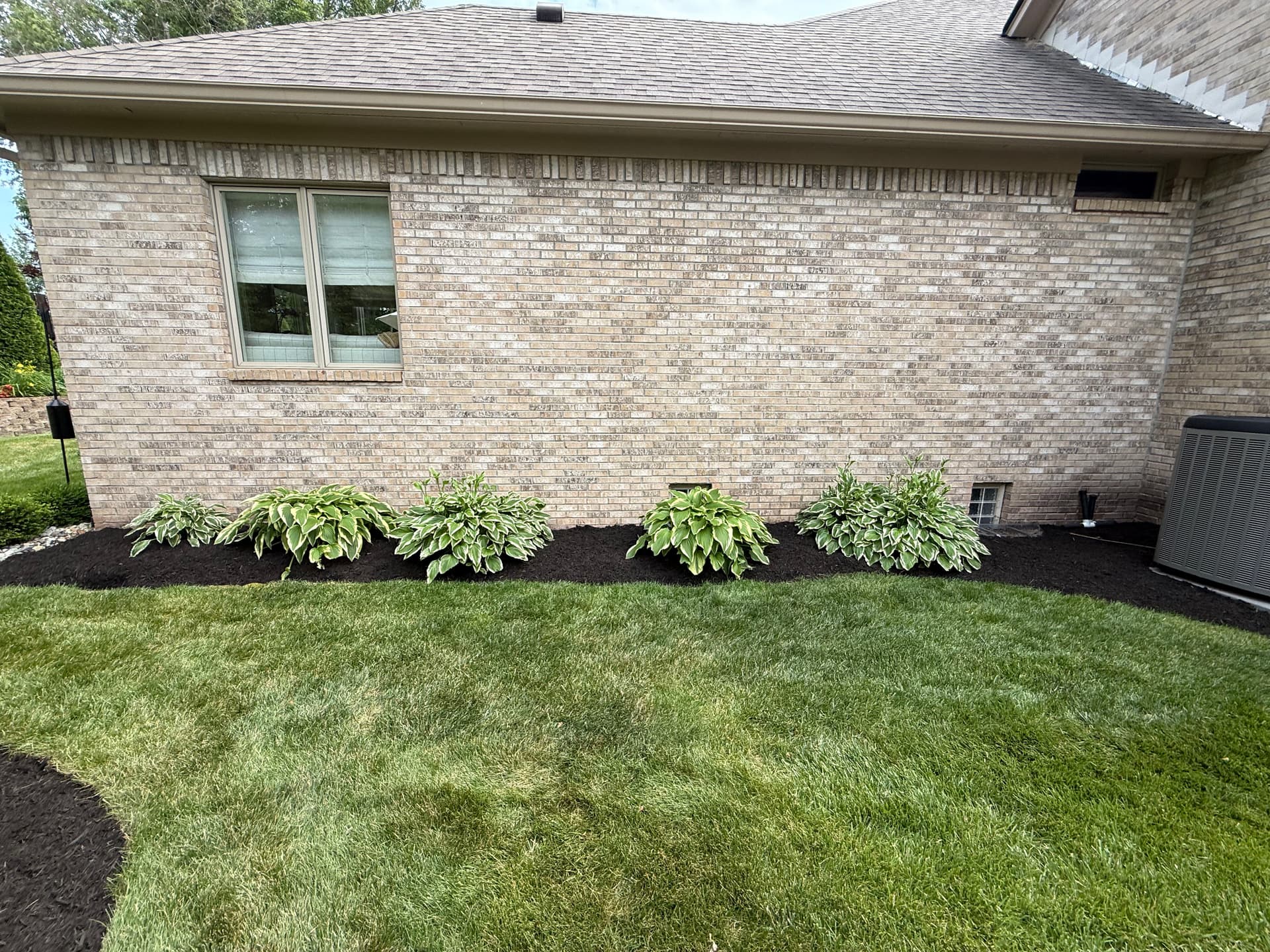Gallery photos for Black Mulch and Clean Beds Make a Big Difference in Noblesville: Image #5